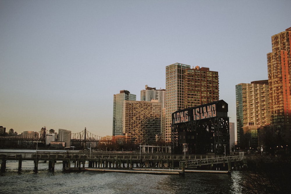 a large body of water next to tall buildings