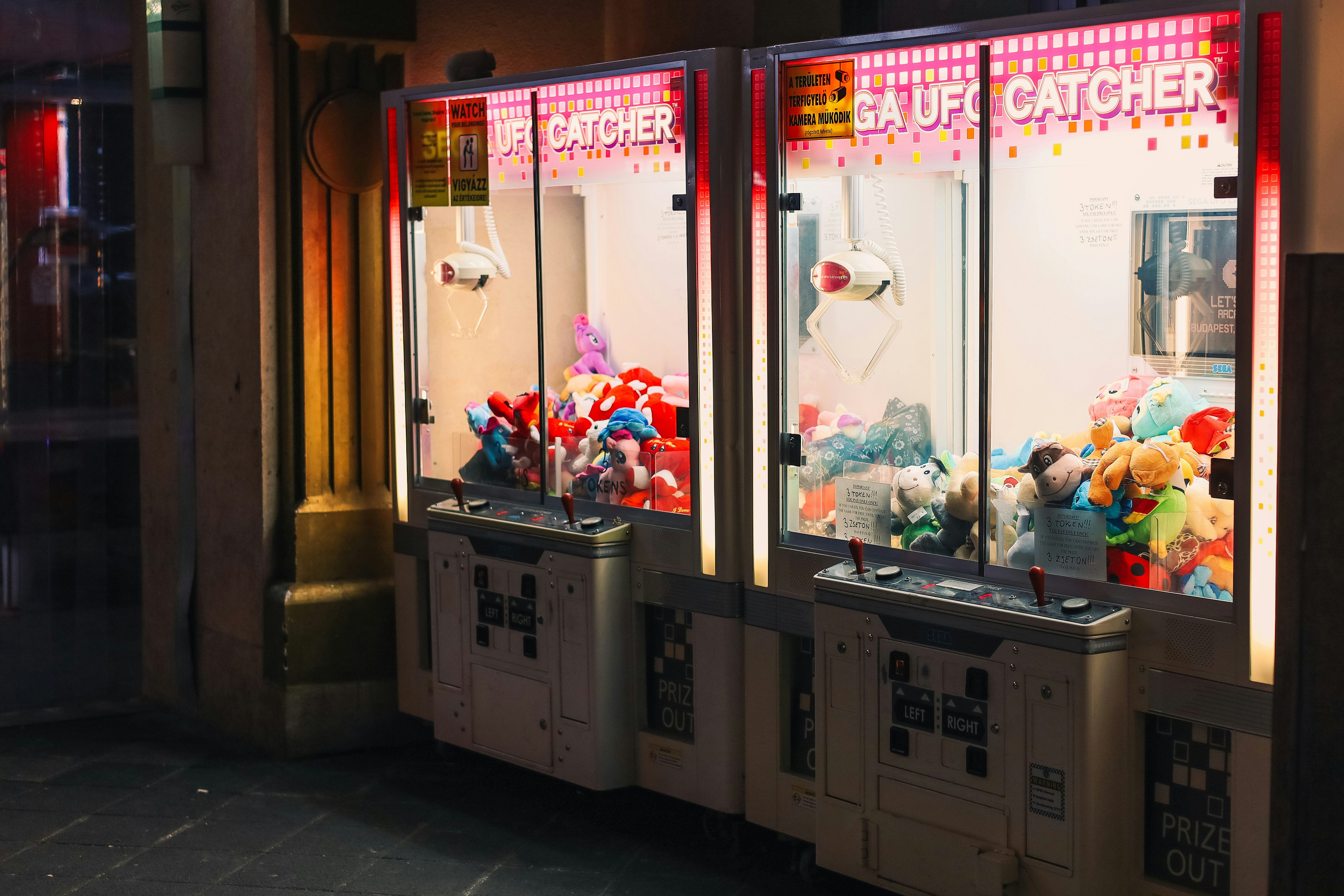 a couple of vending machines sitting next to each other