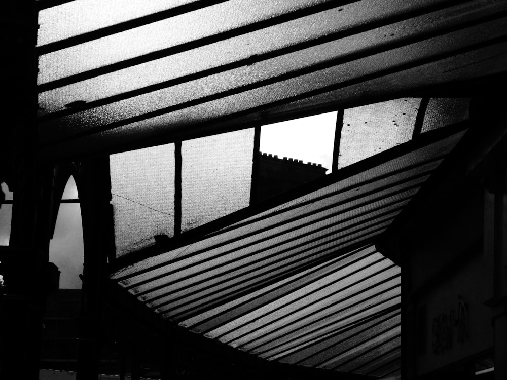 a black and white photo of the roof of a building