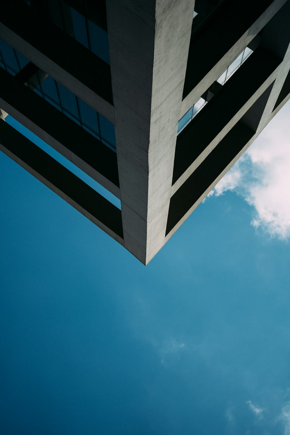 a tall building with a sky background