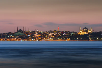 A panoramic view of Istanbul’s waterfront at sunset, highlighting the city’s vibrant real estate.