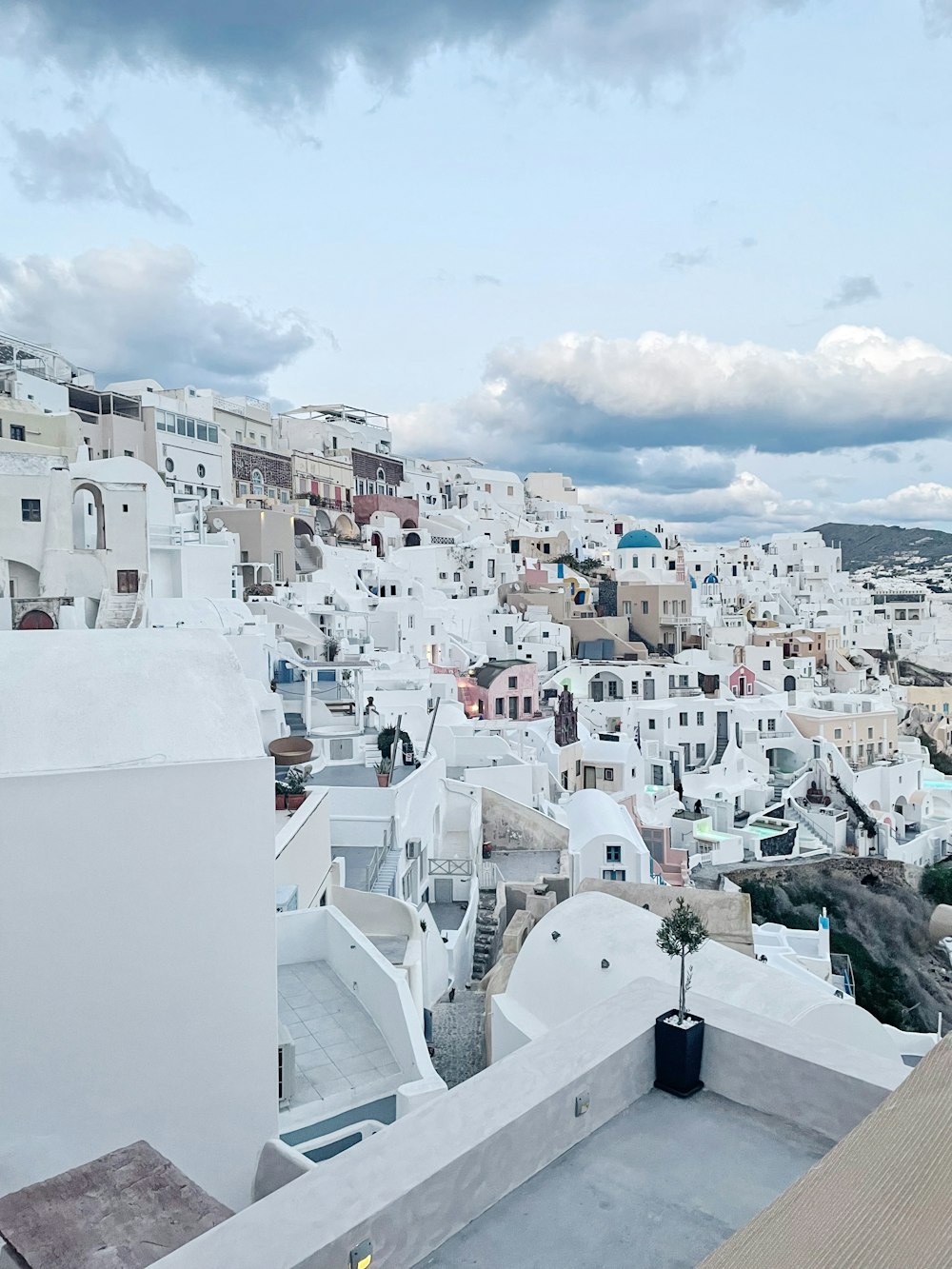 a view of a city with white buildings