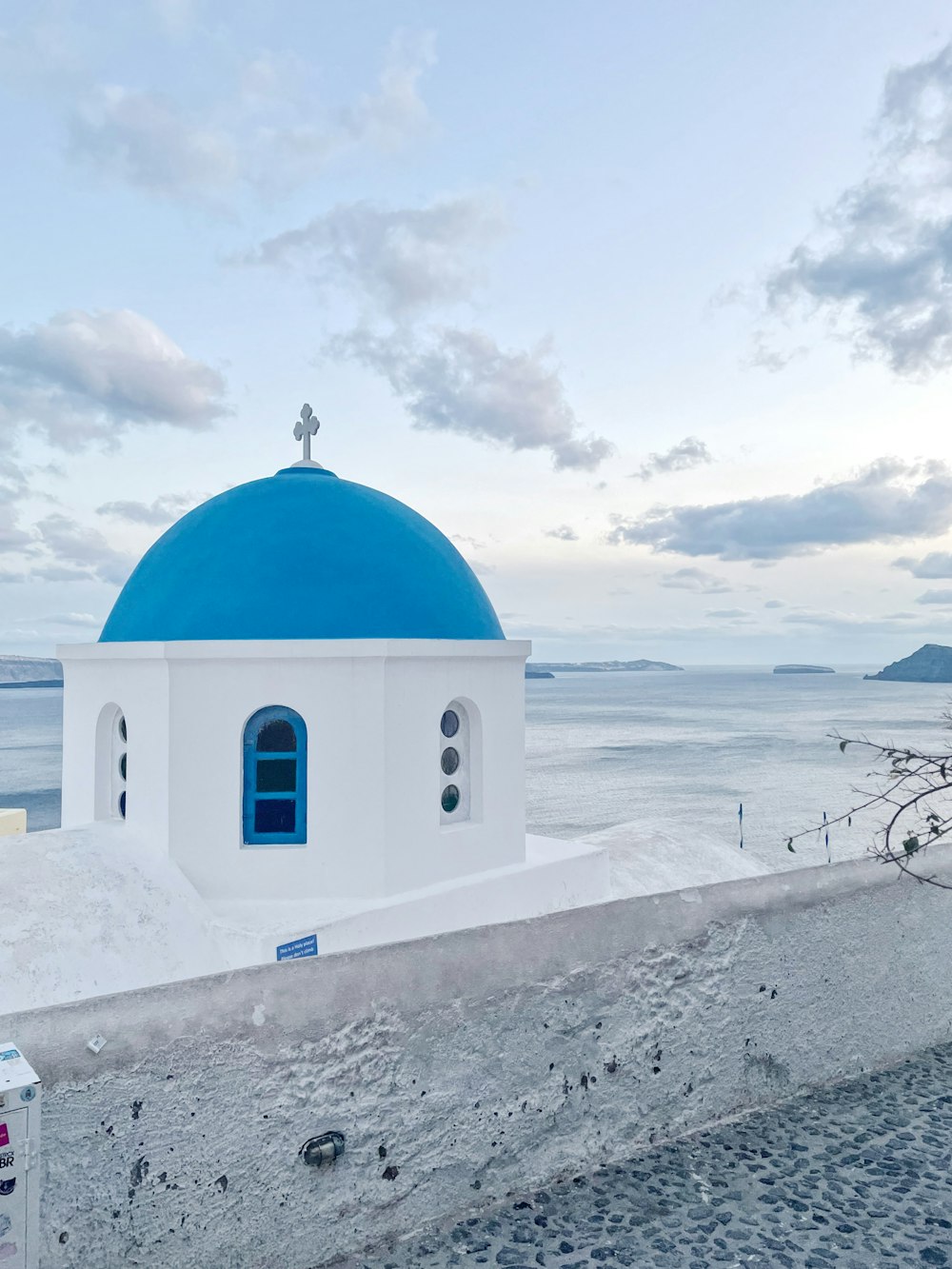 a white and blue building with a blue dome