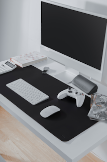 A minimalist gaming setup featuring a high-end mouse and clean cable management.