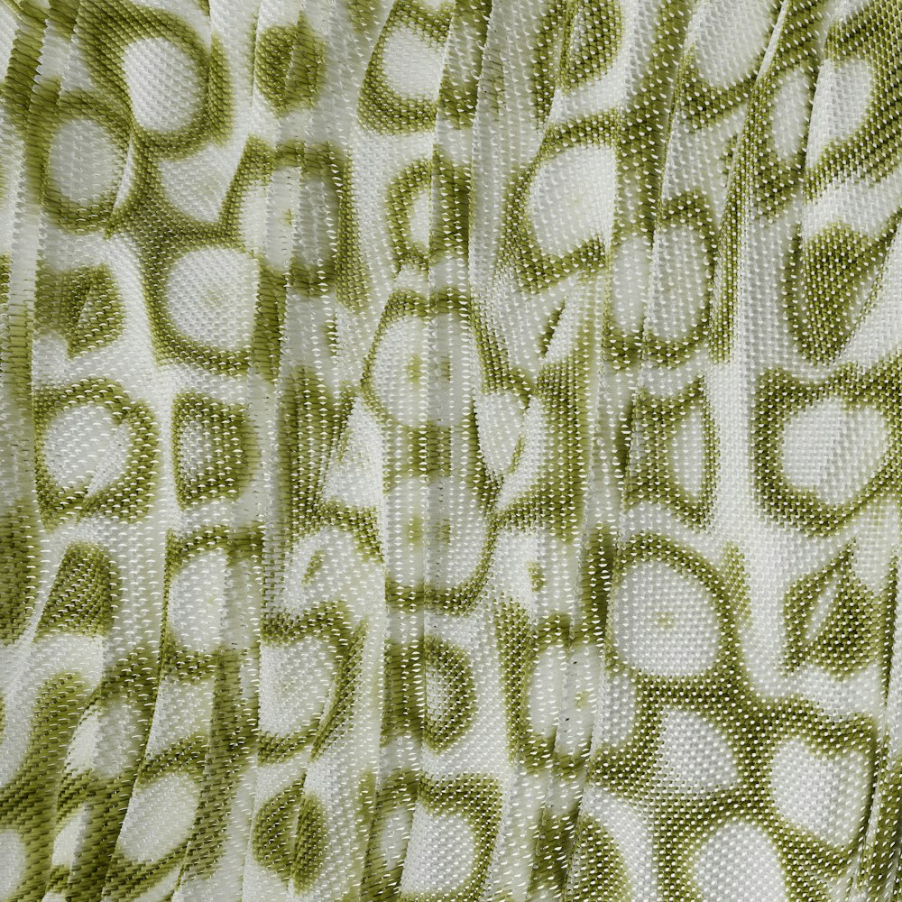 a close up of a curtain with a pattern on it