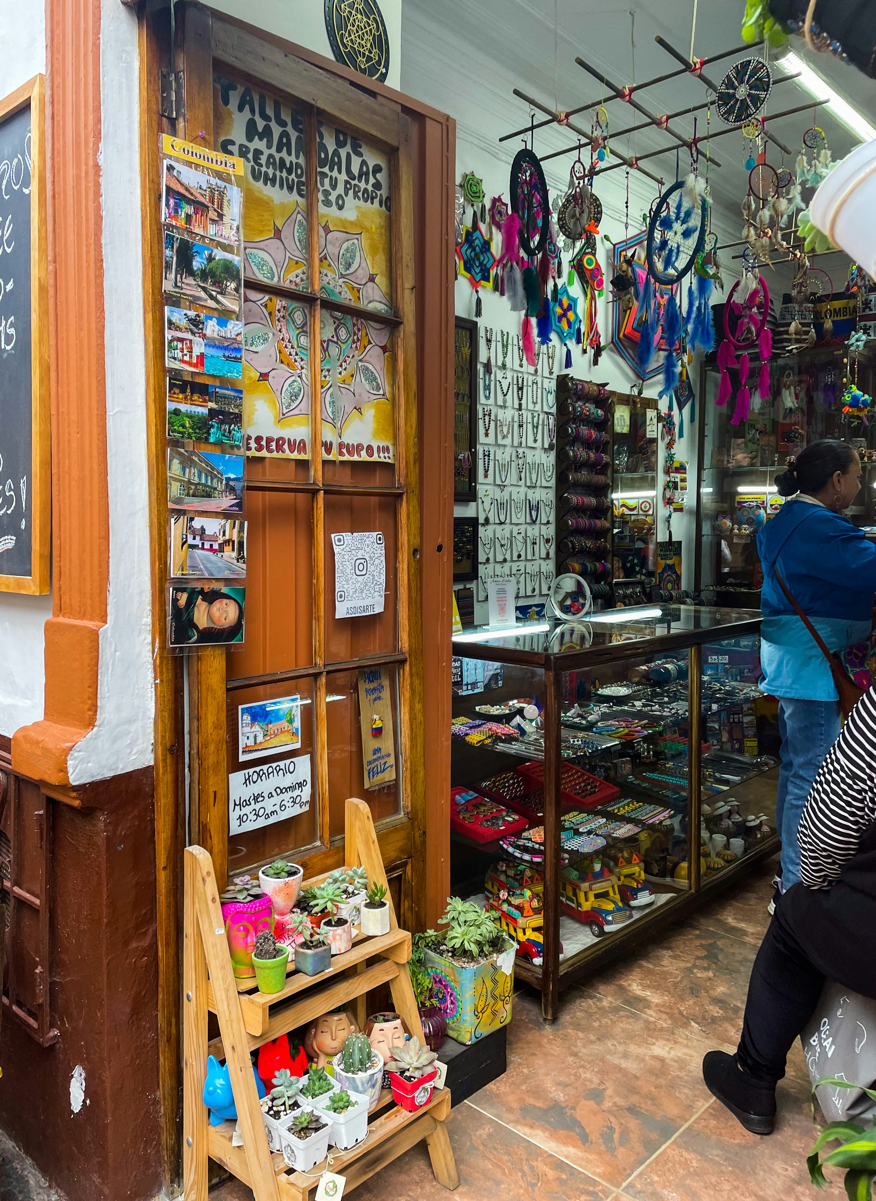 Assorted Florida souvenir items displayed colorfully, bright cheerful retail display