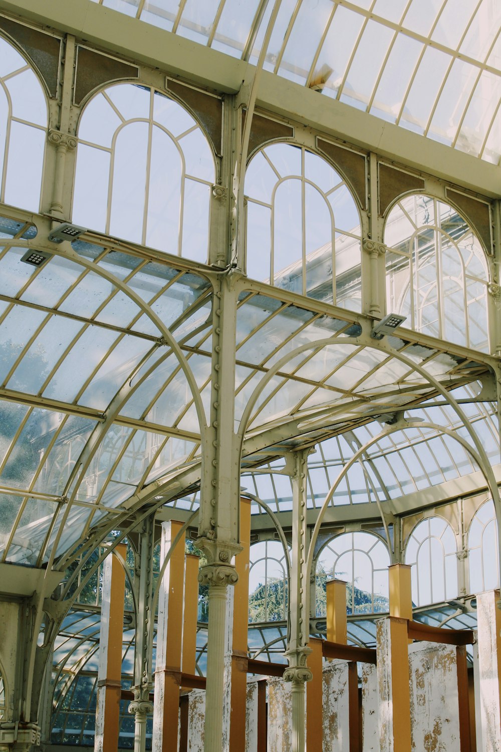 a train station with a large glass roof