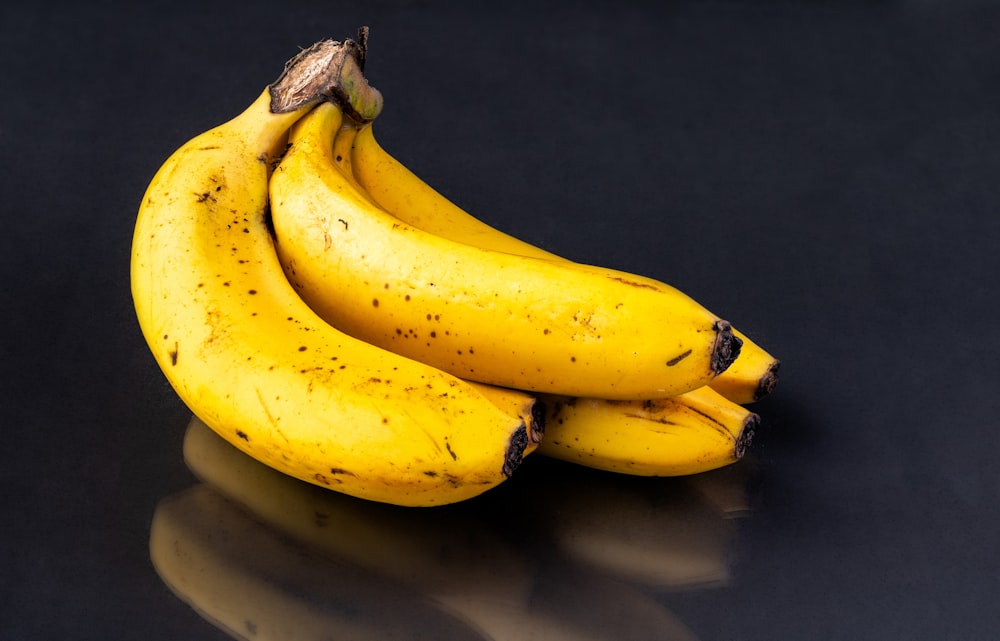 a bunch of bananas sitting on top of a table