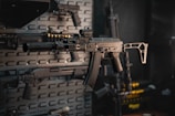 a rifle mounted to a wall in a room