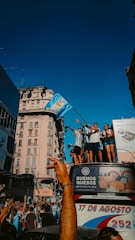 A group of people celebrating a sports victory.