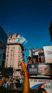 A group of people celebrating a sports victory.