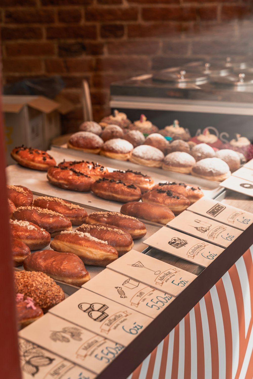 a display case filled with lots of donuts