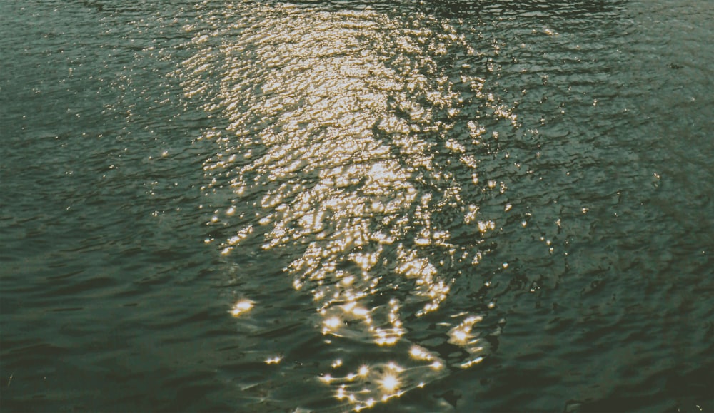 a large boat floating on top of a body of water