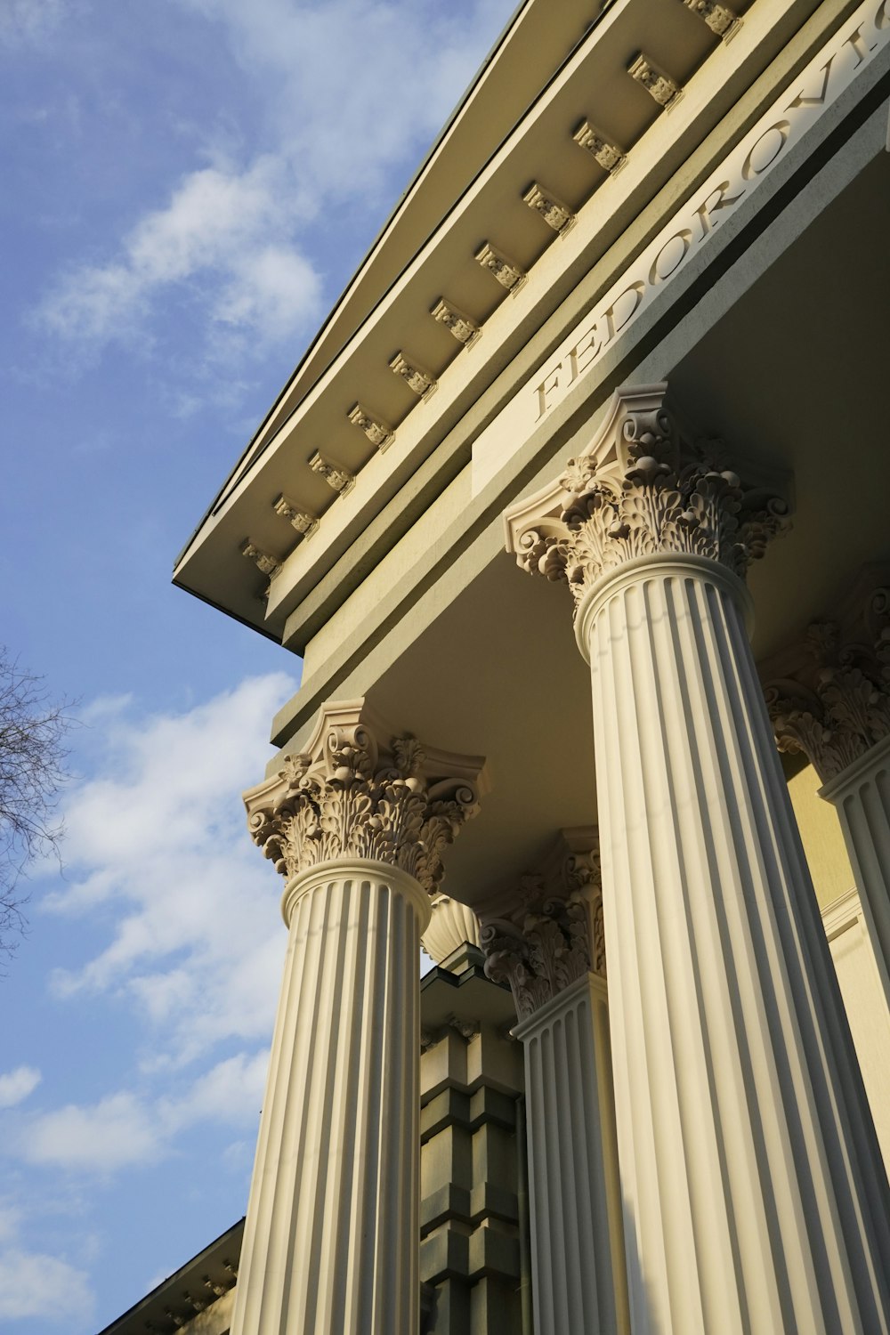a close up of the columns of a building
