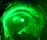 A group of silhouetted people are standing before a large, swirling green vortex or portal that is illuminated with bright light. The green lighting creates a mystical and otherworldly atmosphere.