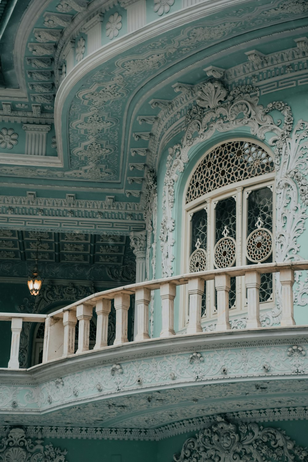 a balcony with a balcony railing and a light