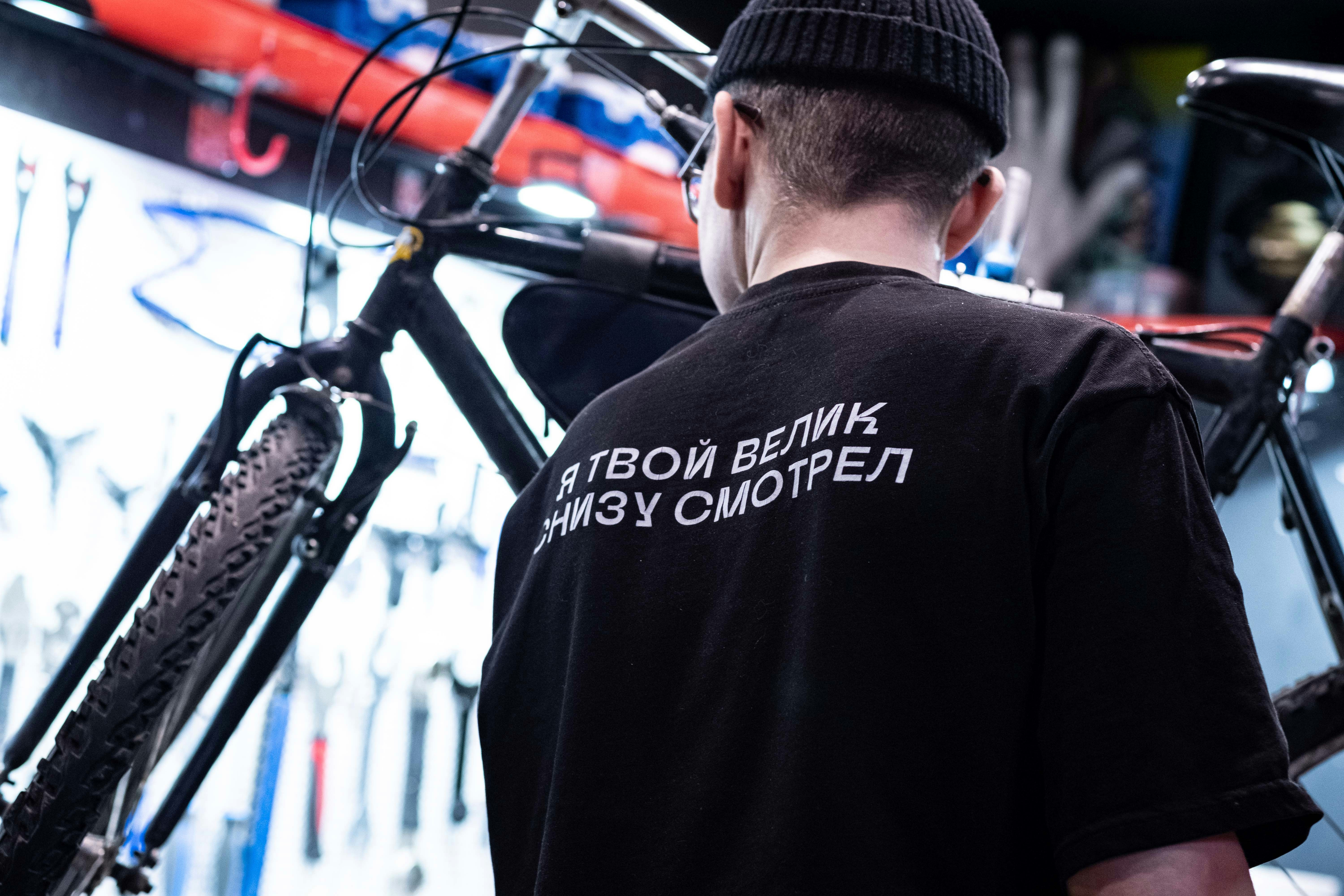professional bike mechanic fixing a bike