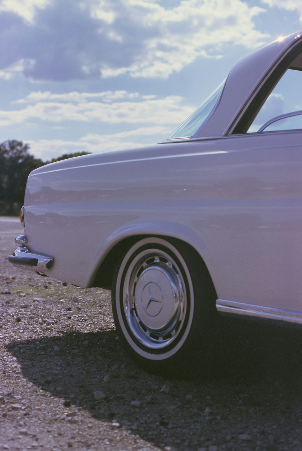 a white car parked in a parking lot