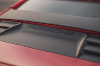 a close up of a porsche emblem on a car