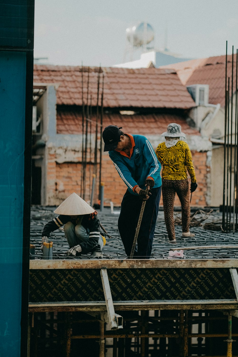 two men are working on a construction site