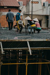 a group of people standing on top of a roof