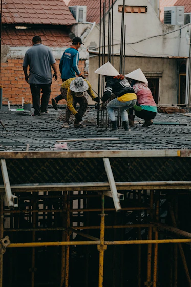 a group of people standing on top of a roof