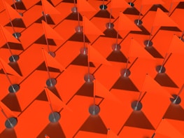 Symmetrical arrangement of muted red, white, and blue flags against a soft gray background.