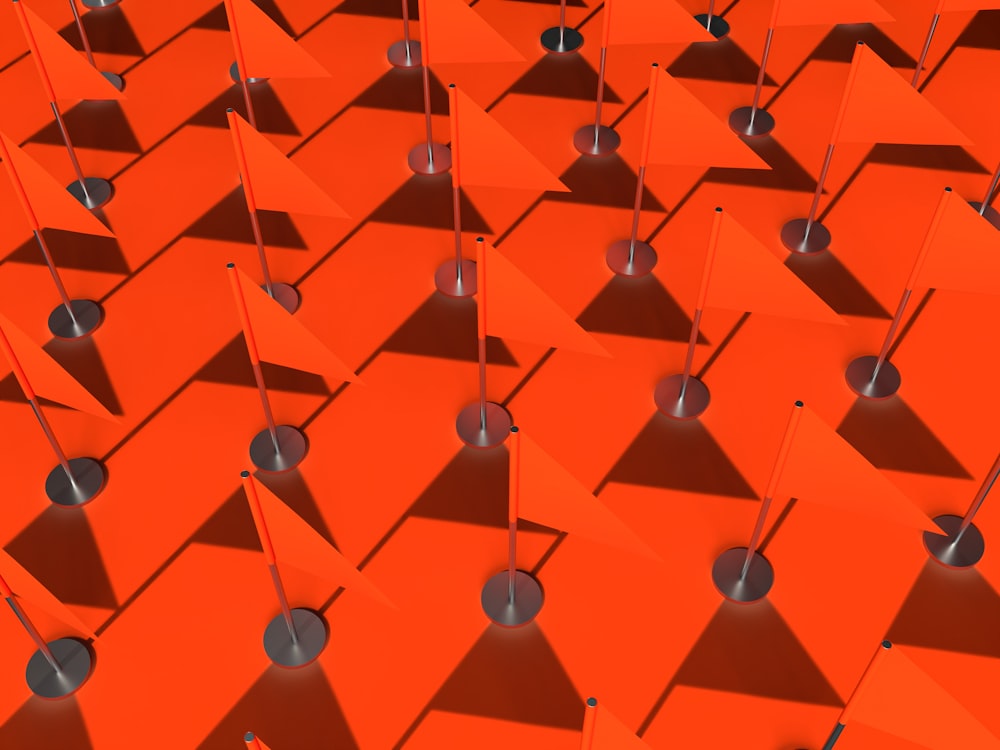 a large group of orange squares and poles
