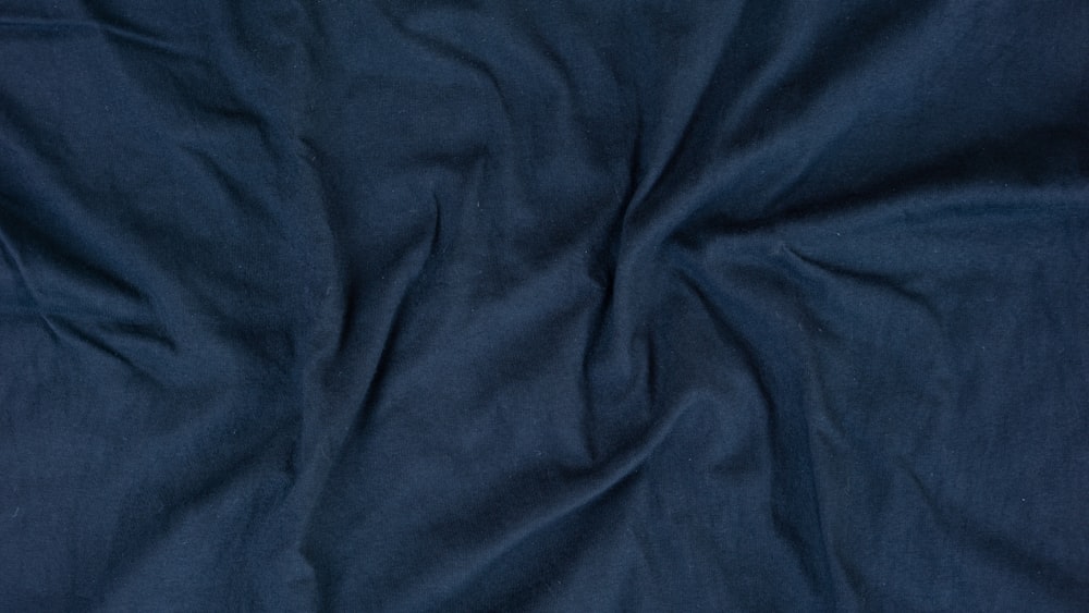 a close up view of a blue fabric