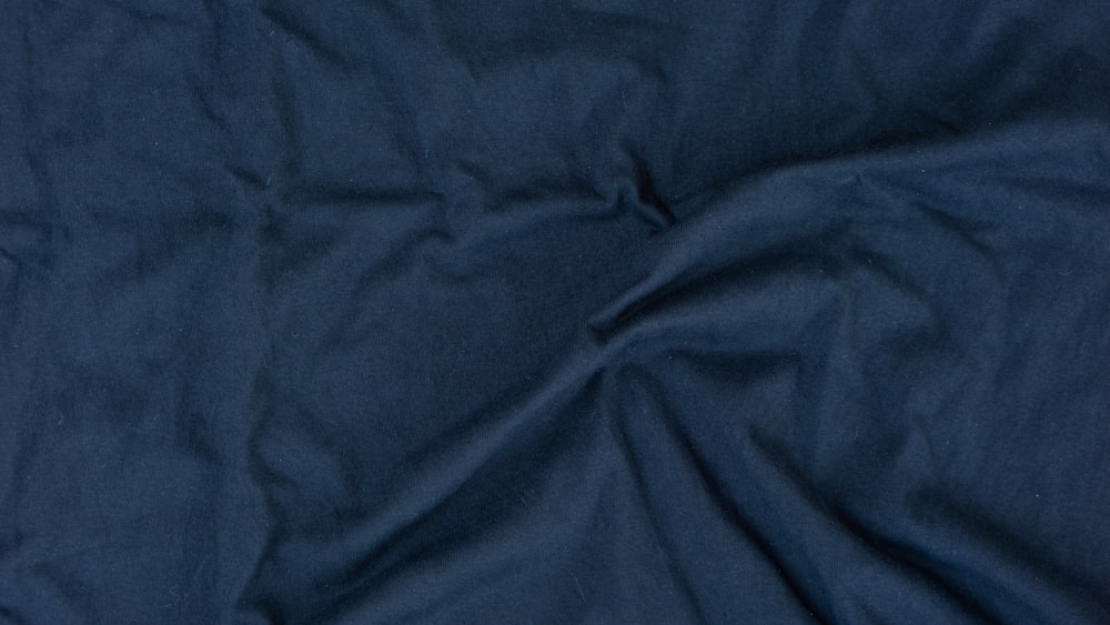 a close up view of a blue fabric