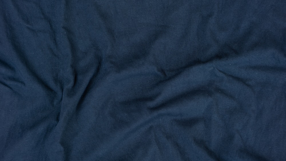 a close up view of a blue fabric