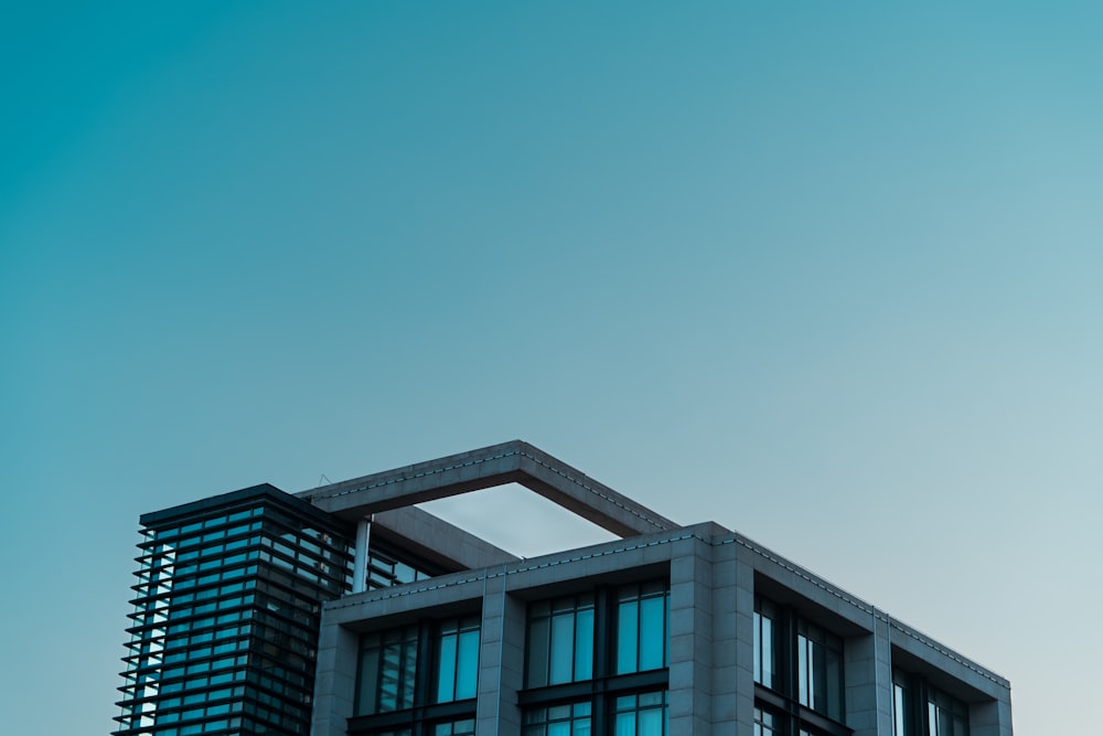 a tall building with a sky background