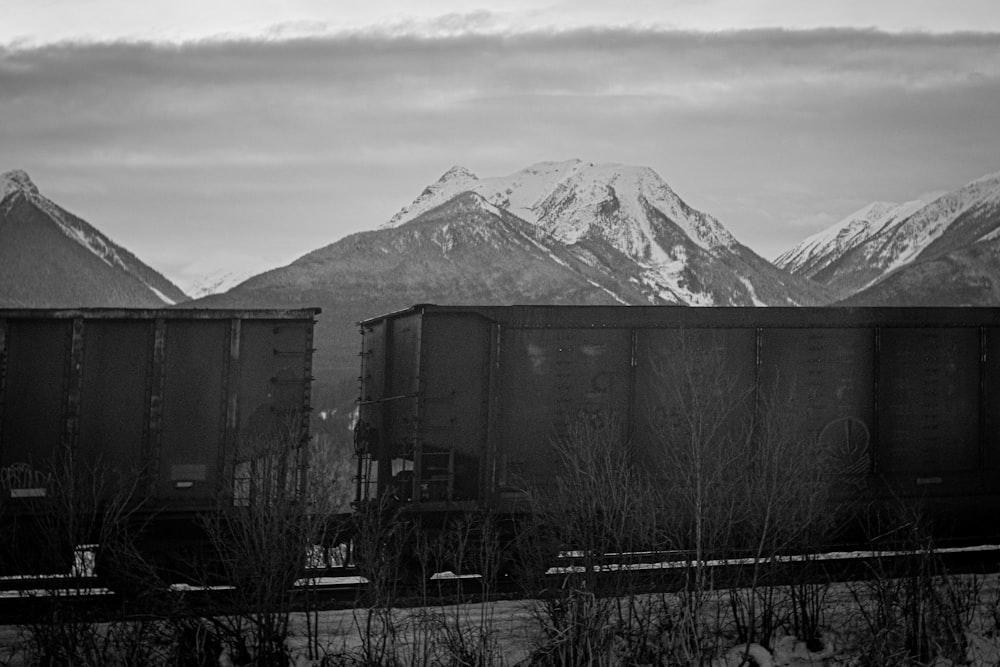 a black and white photo of a mountain range