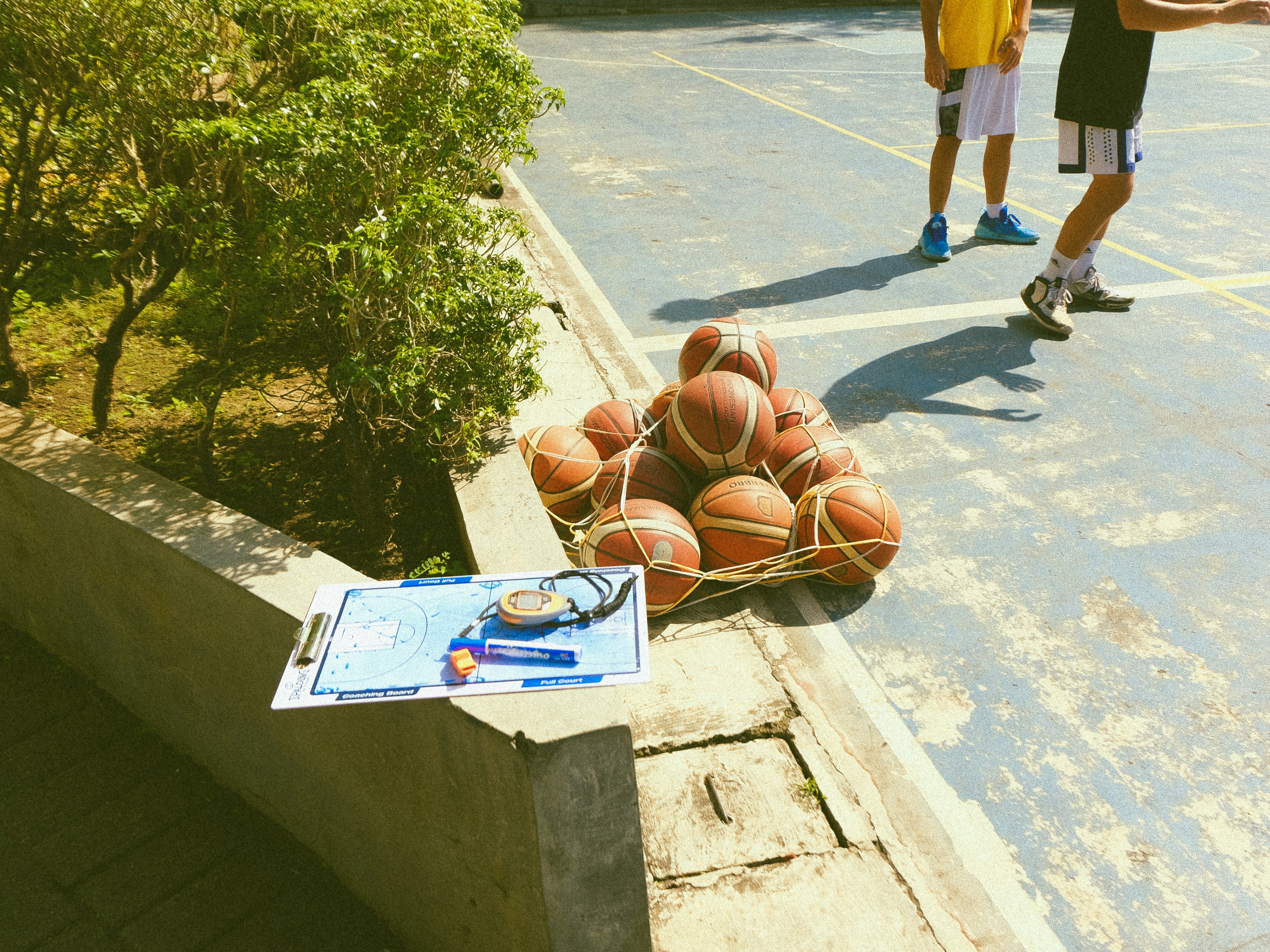 Basketballs on court