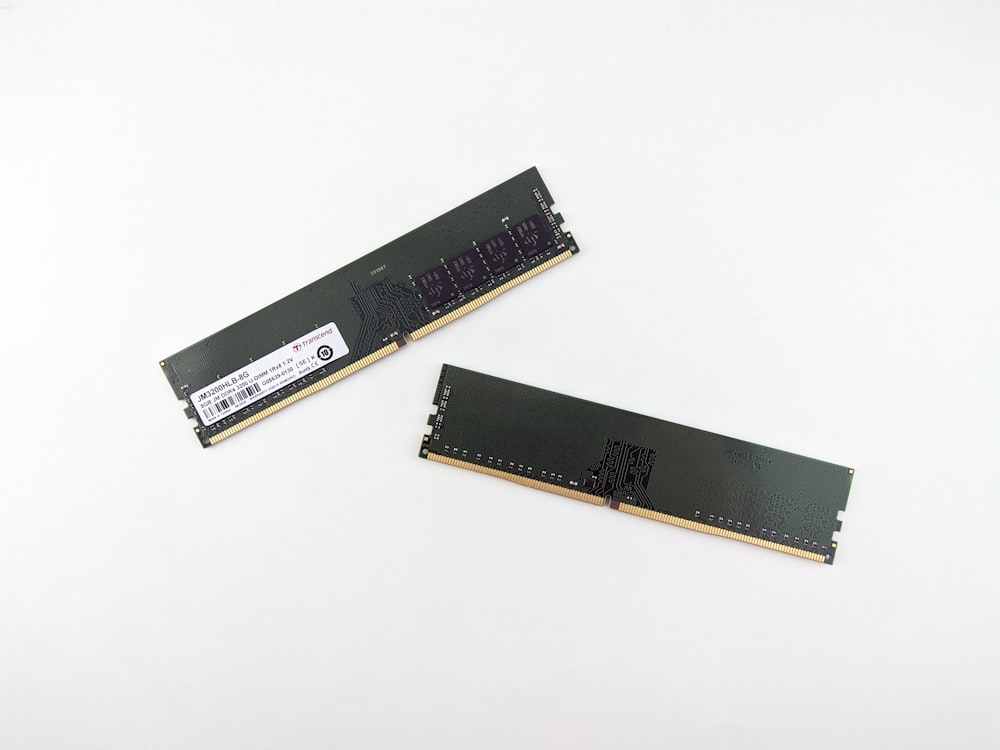 a pair of ram modules sitting on top of a white table