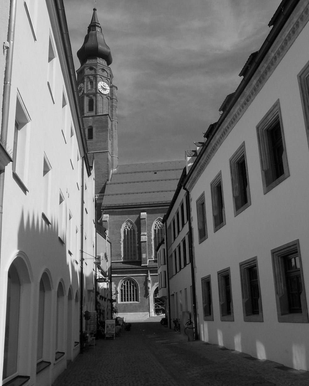 a black and white photo of a clock tower