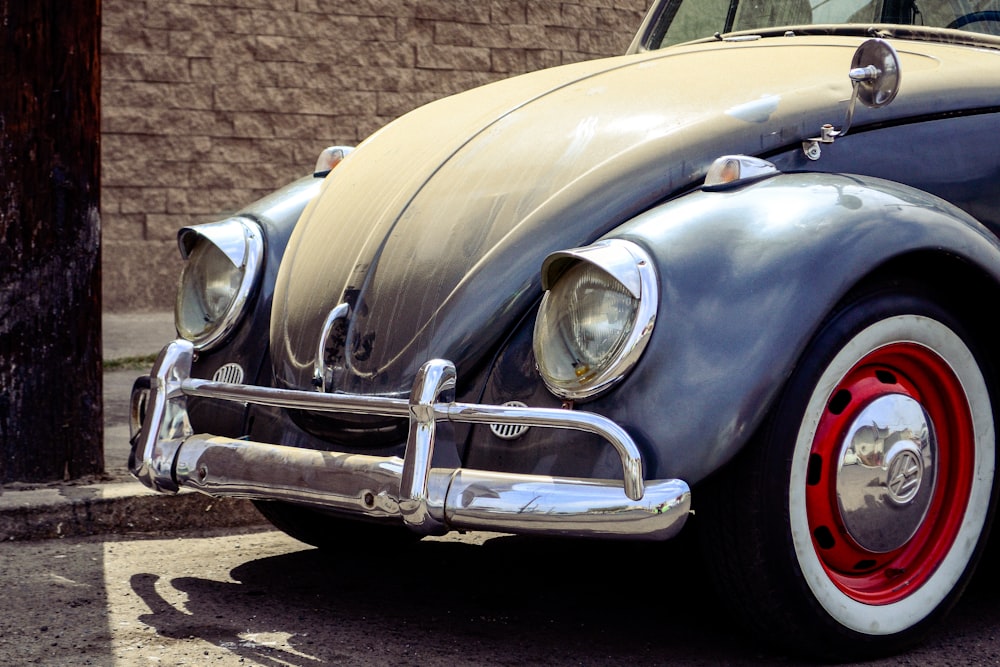 a close up of a car parked on a street