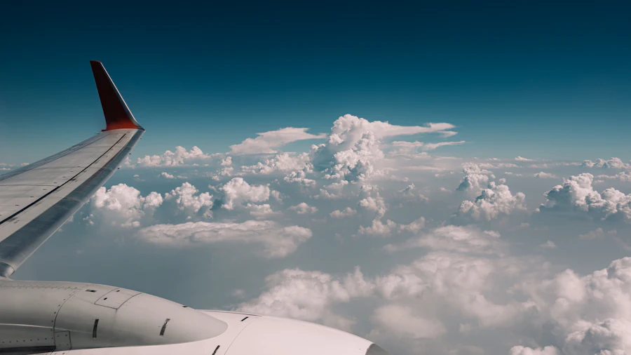 Aircraft wing above the clouds