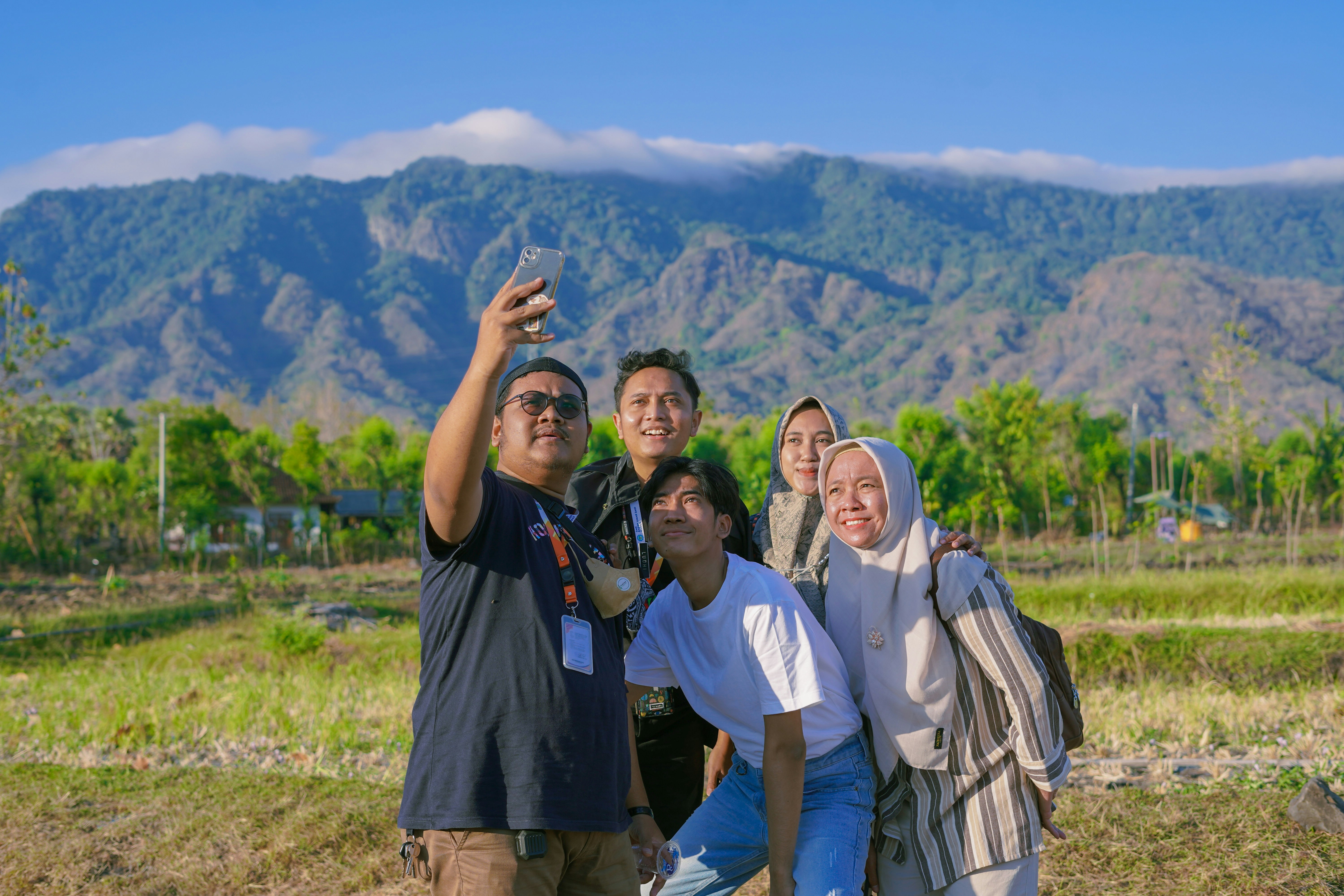 a group of people taking a picture together