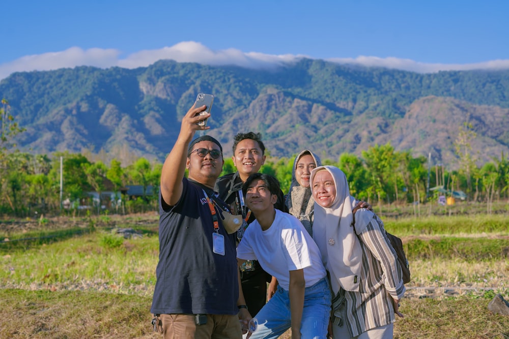 a group of people taking a picture together