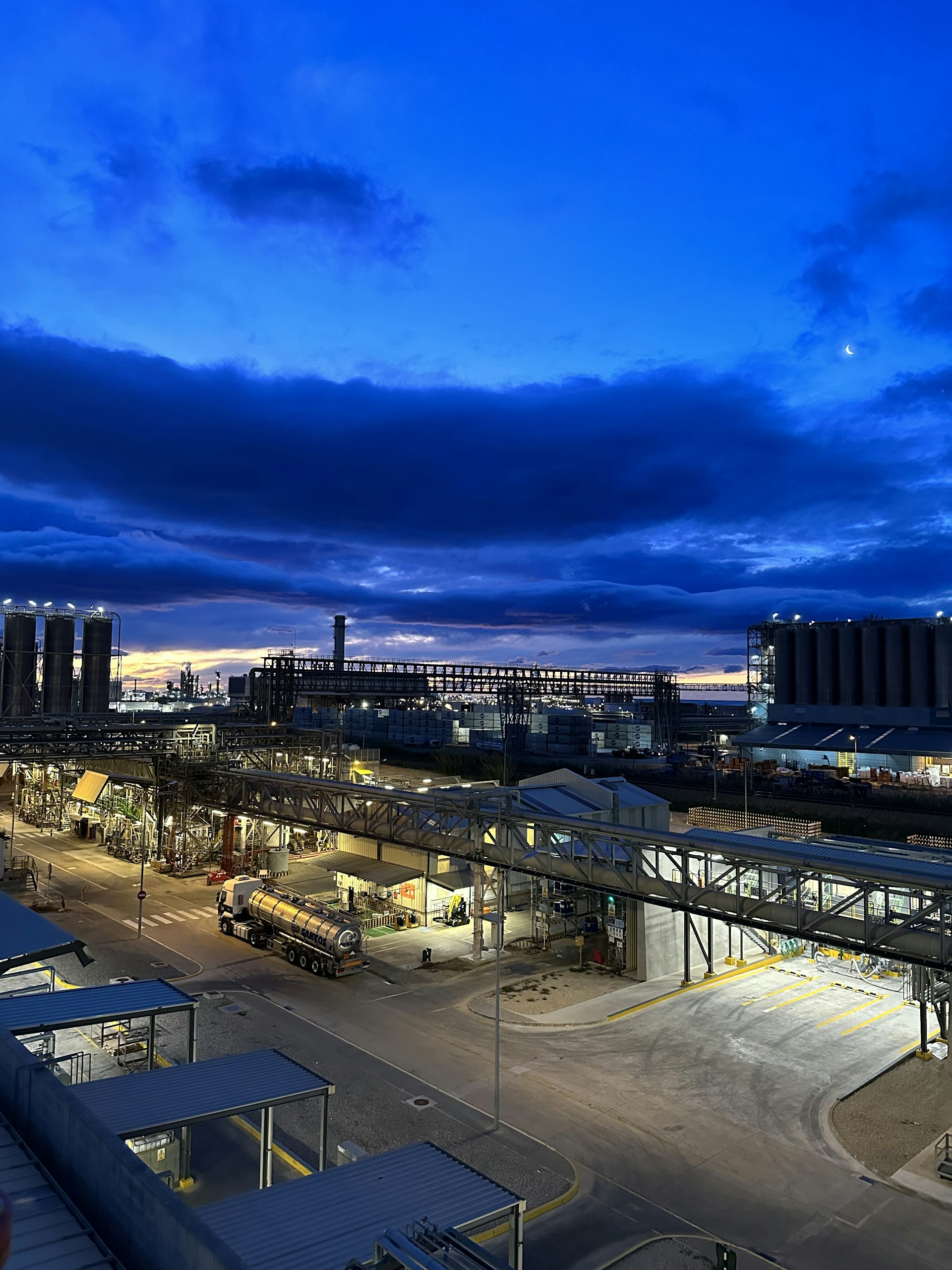 woman wearing yellow long-sleeved dress under white clouds and blue sky during daytime