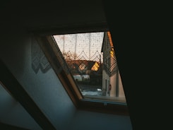a view of a street through a window