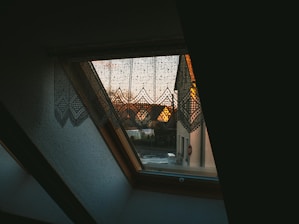 a view of a street through a window