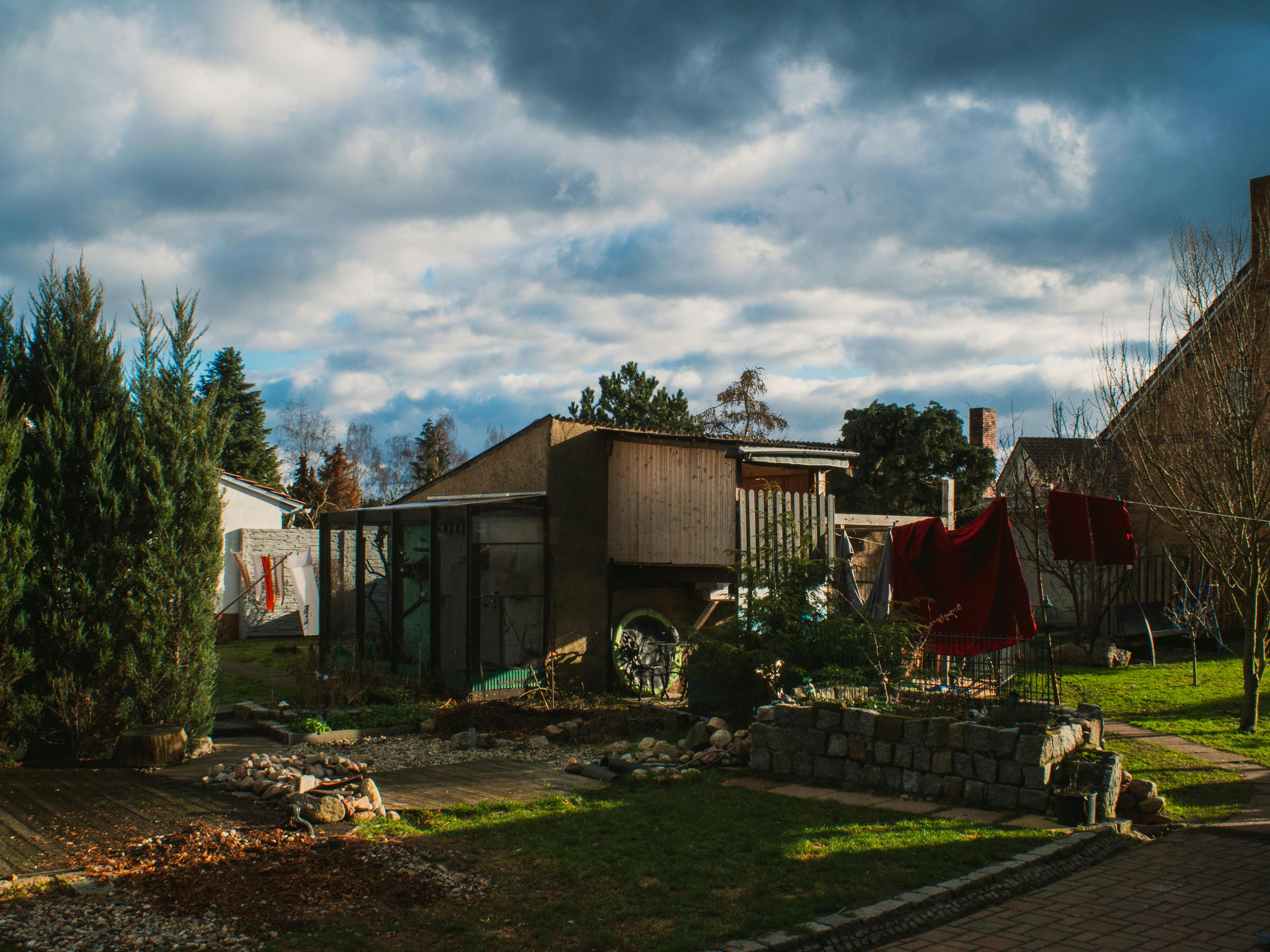 a house with a lot of trees in the yard