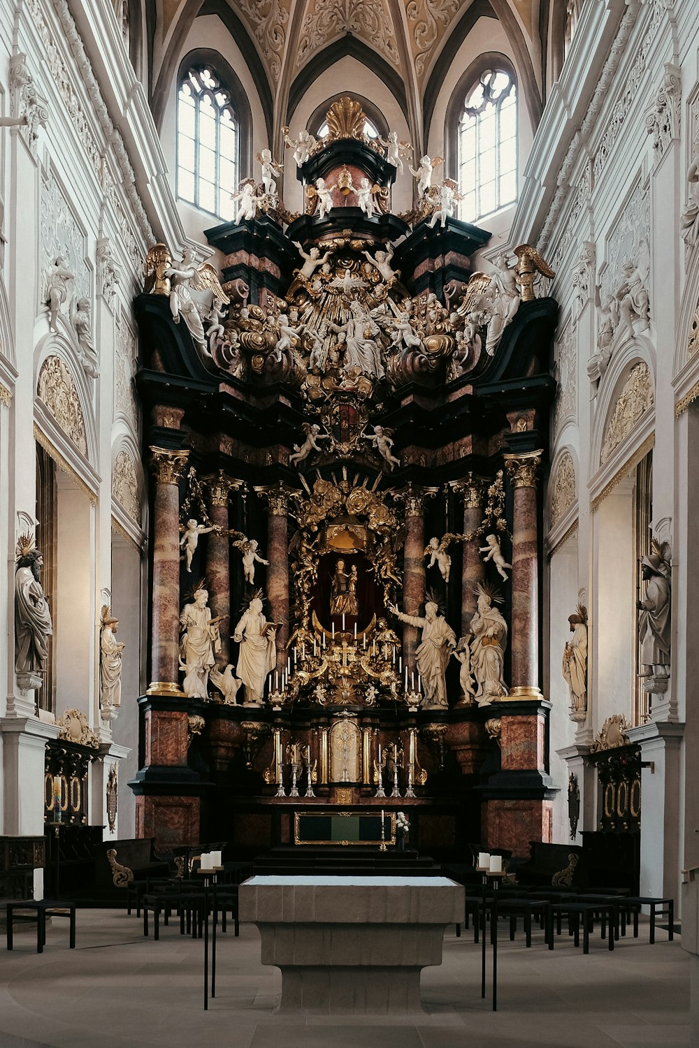 a church with a large alter in the middle of it