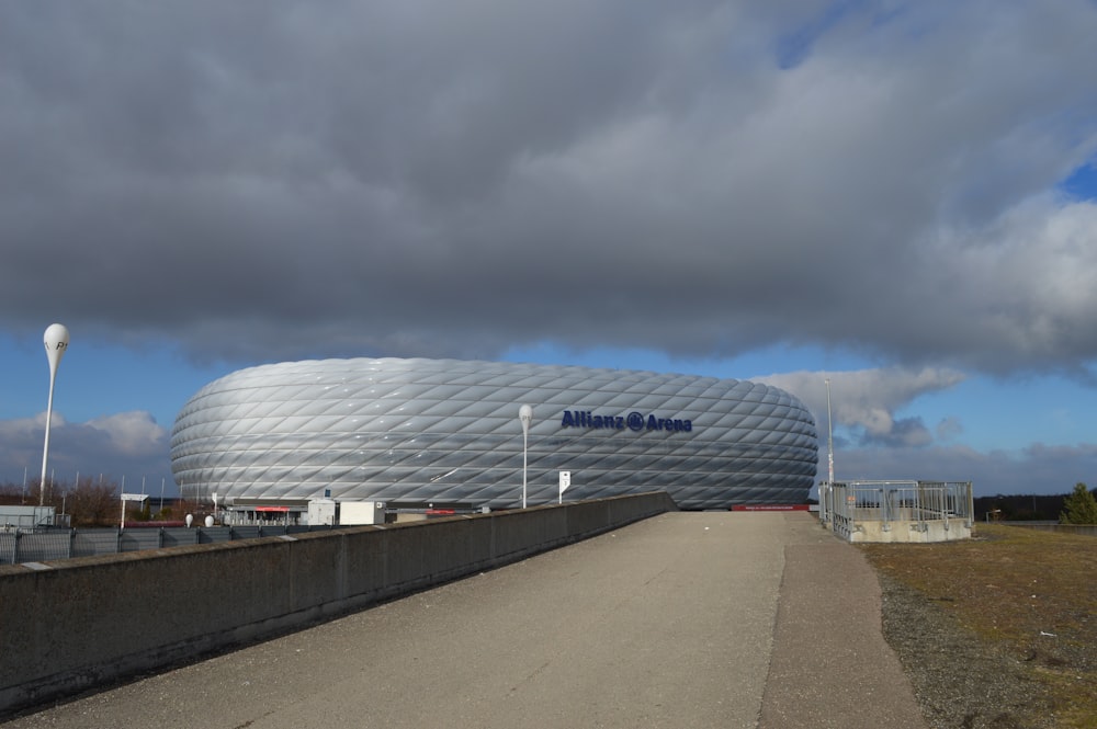 a large building sitting on the side of a road