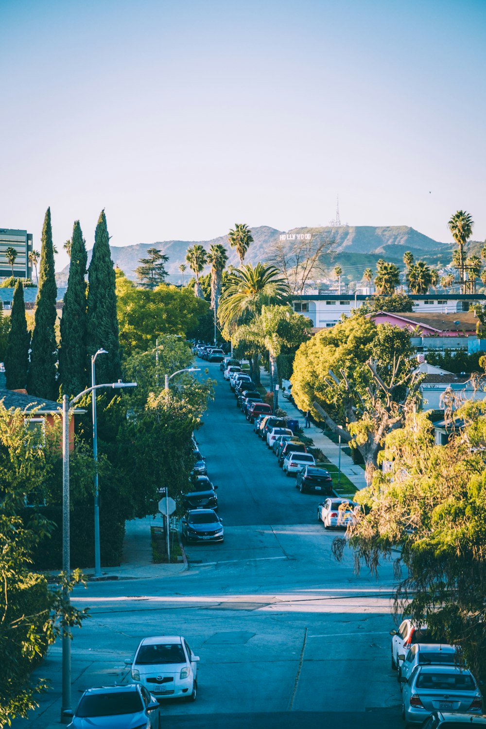 a street with cars parked on both sides of it