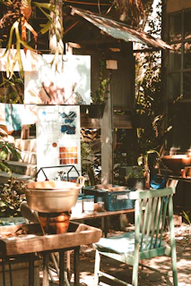 A beautifully arranged outdoor space featuring various furniture pieces.