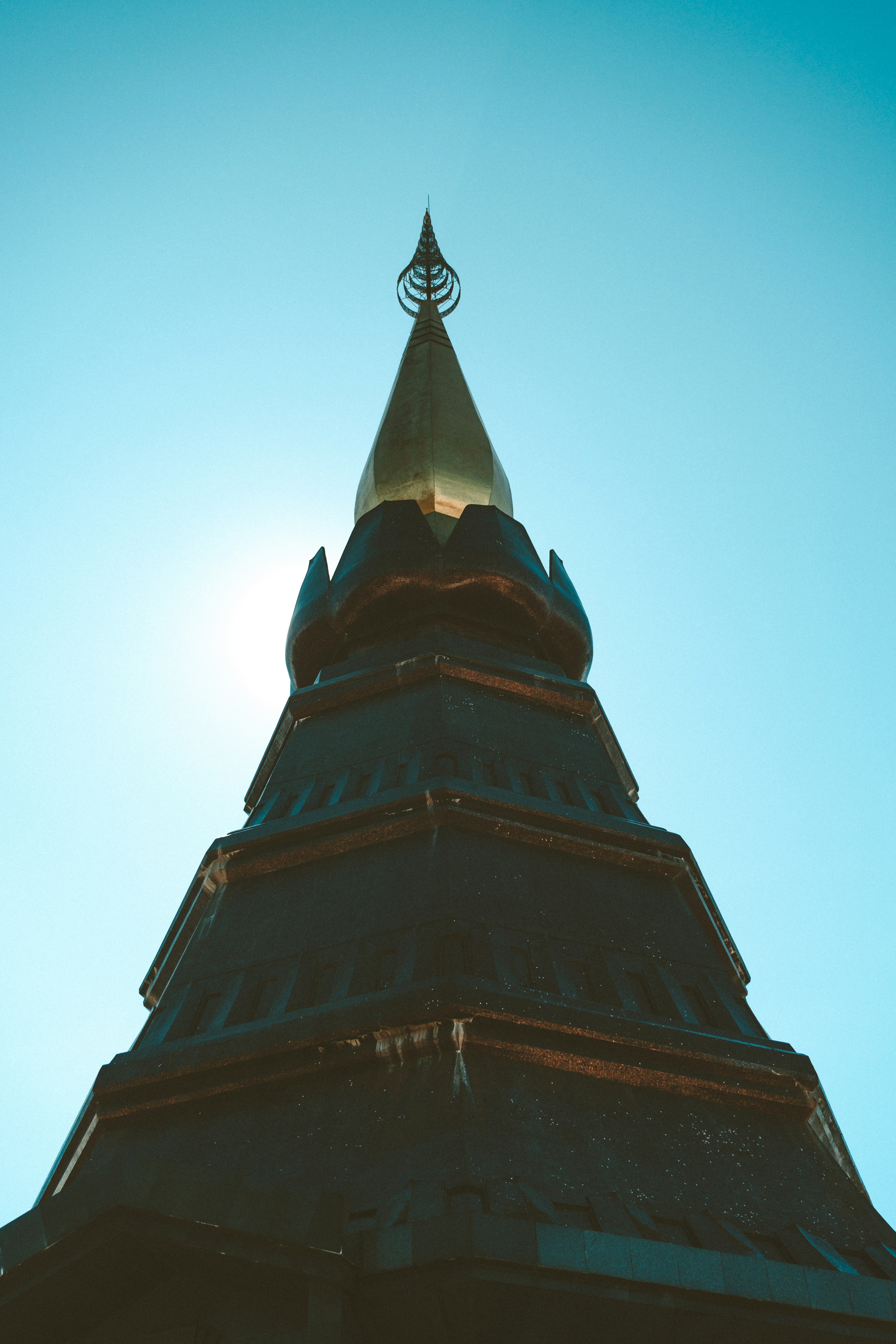 a tall tower with a clock on the top of it