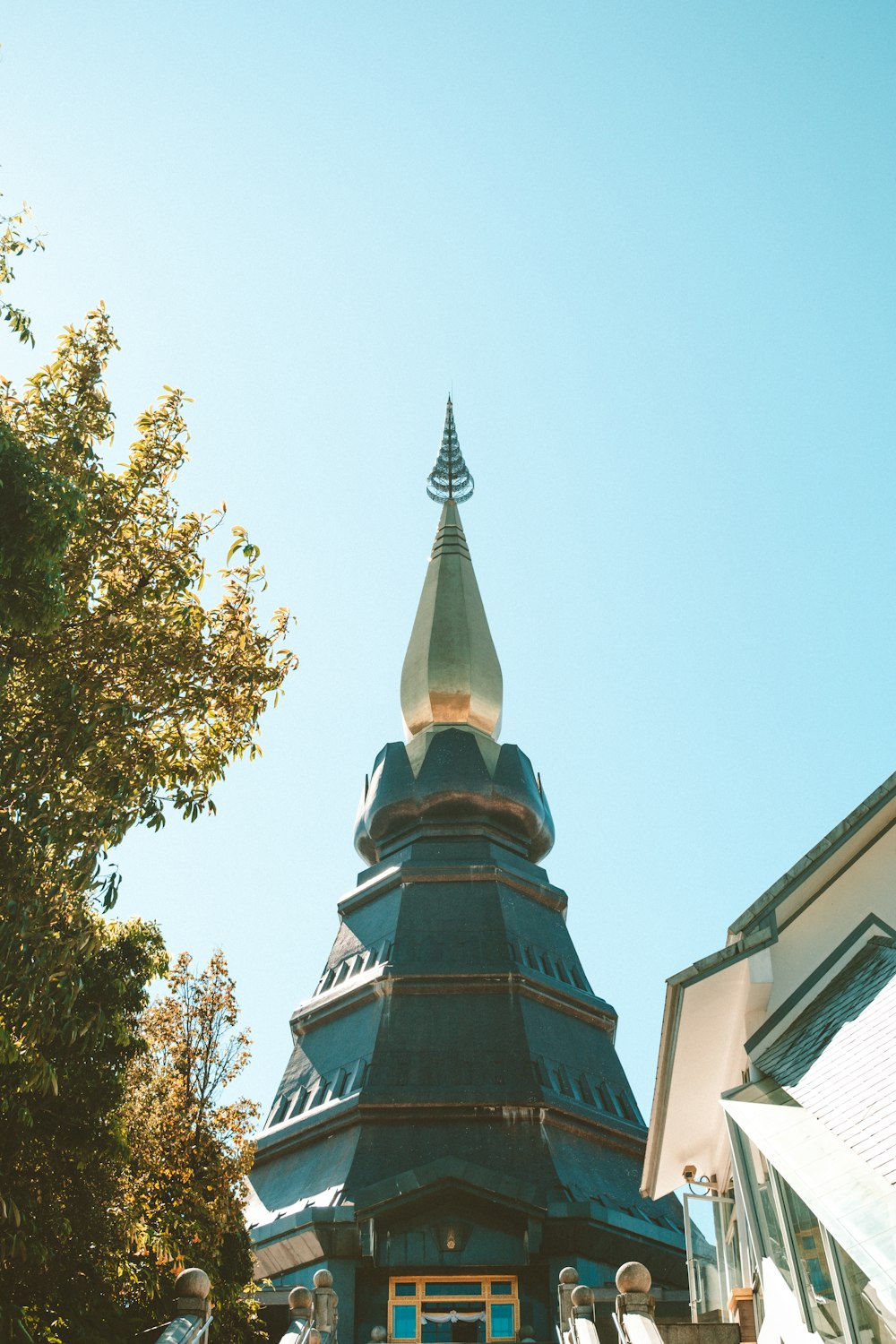 a tall tower with a clock on the top of it